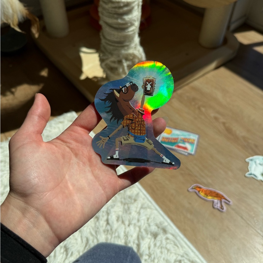 Dutch Bros Holographic Character Sticker with Green and Blue Accents